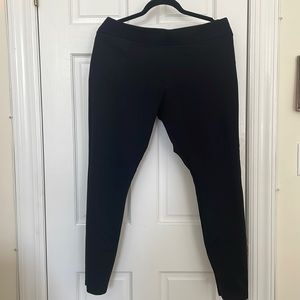 Black, legging-style stretchy pant. American giant